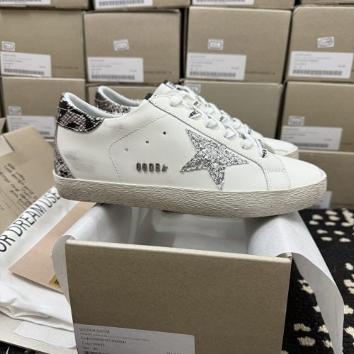 Golden Goose-style white sneakers with glitter star and snake print heel – front side view